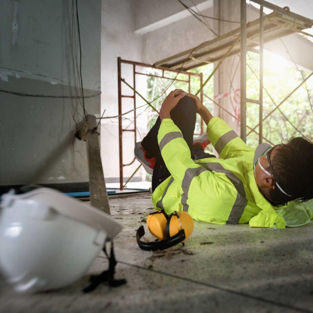 stock-photo-knee-accident-at-work-of-construction-worker-at-site-builder-accident-falls-scaffolding-on-floor-1793973541